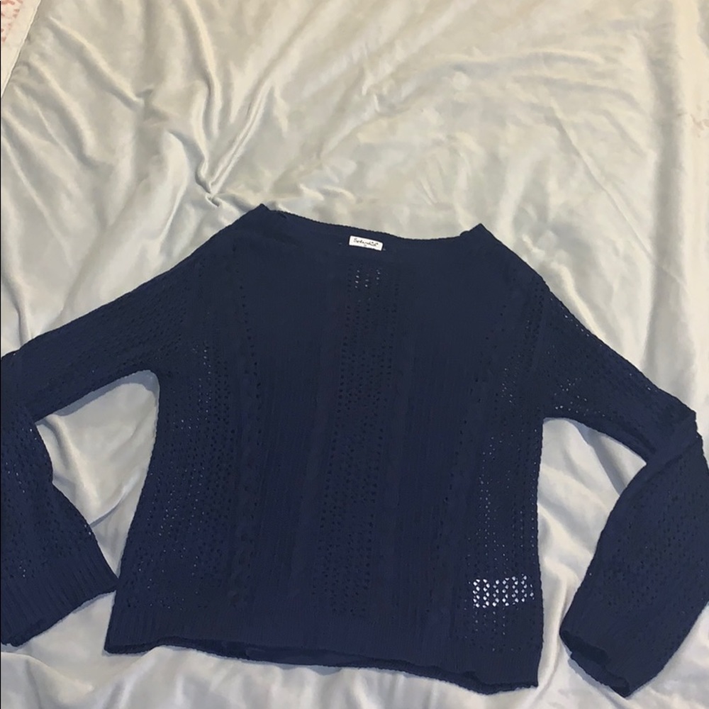 navy sweater.